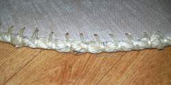 Photo: Rope edge sewn to the shield edge, at the point where the two rope ends meet