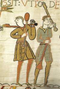 Photo: detail shot carpet of Bayeux, two people carrying spades on their shoulder